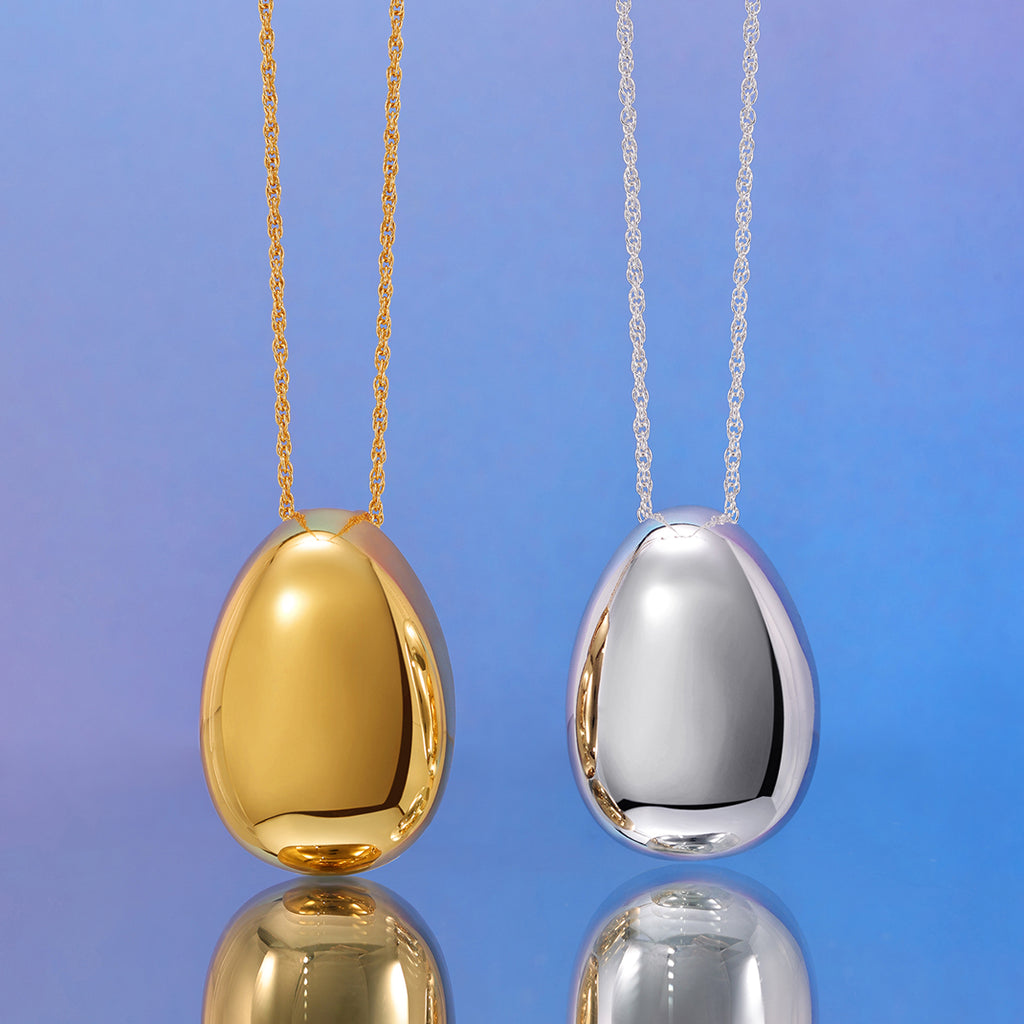 Gleaming Golden Egg Necklace: A Stylish Spotlight